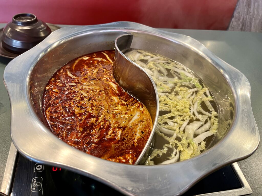 スキ ダーラーの麻辣と清湯のスープ